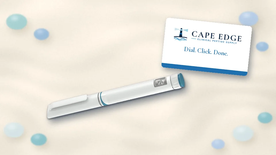 Cape Edge card and pre-filled pen on Cape Cod sand with sea glass